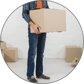 low-section-man-holding-cardboard-box-his-hand@2x